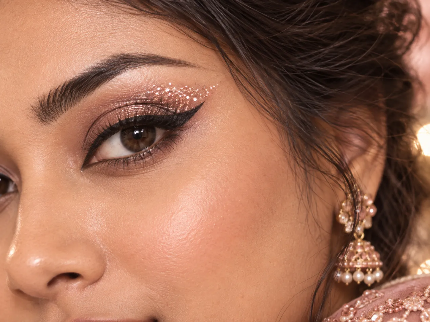 Glitter eyeliner festive eye makeup look in Bangladesh